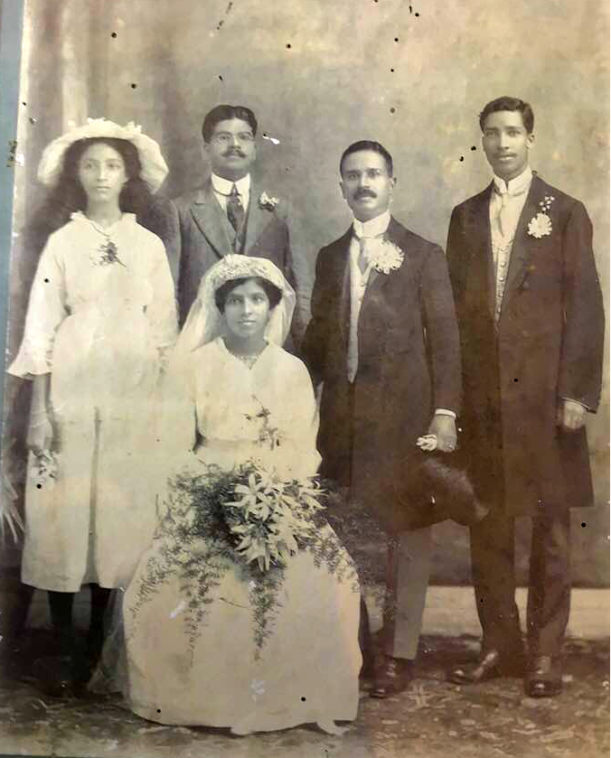Taken 25th  October 1915.
Bride seated:  Maria  Flavia Cecilia Mascarenhas
Groom:  Joaquim Ignatus Pinto
Bridesmaid: Bridget Falleiro (nee DaCosta)
Best men:  Luis Mascarehas and Philip Sequeira